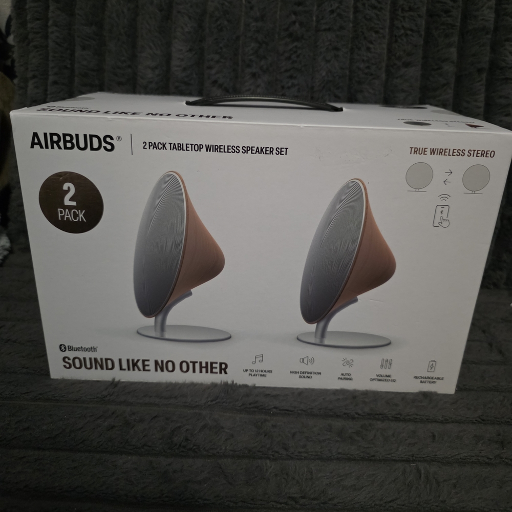 Brown and Silver Wireless Speaker Set